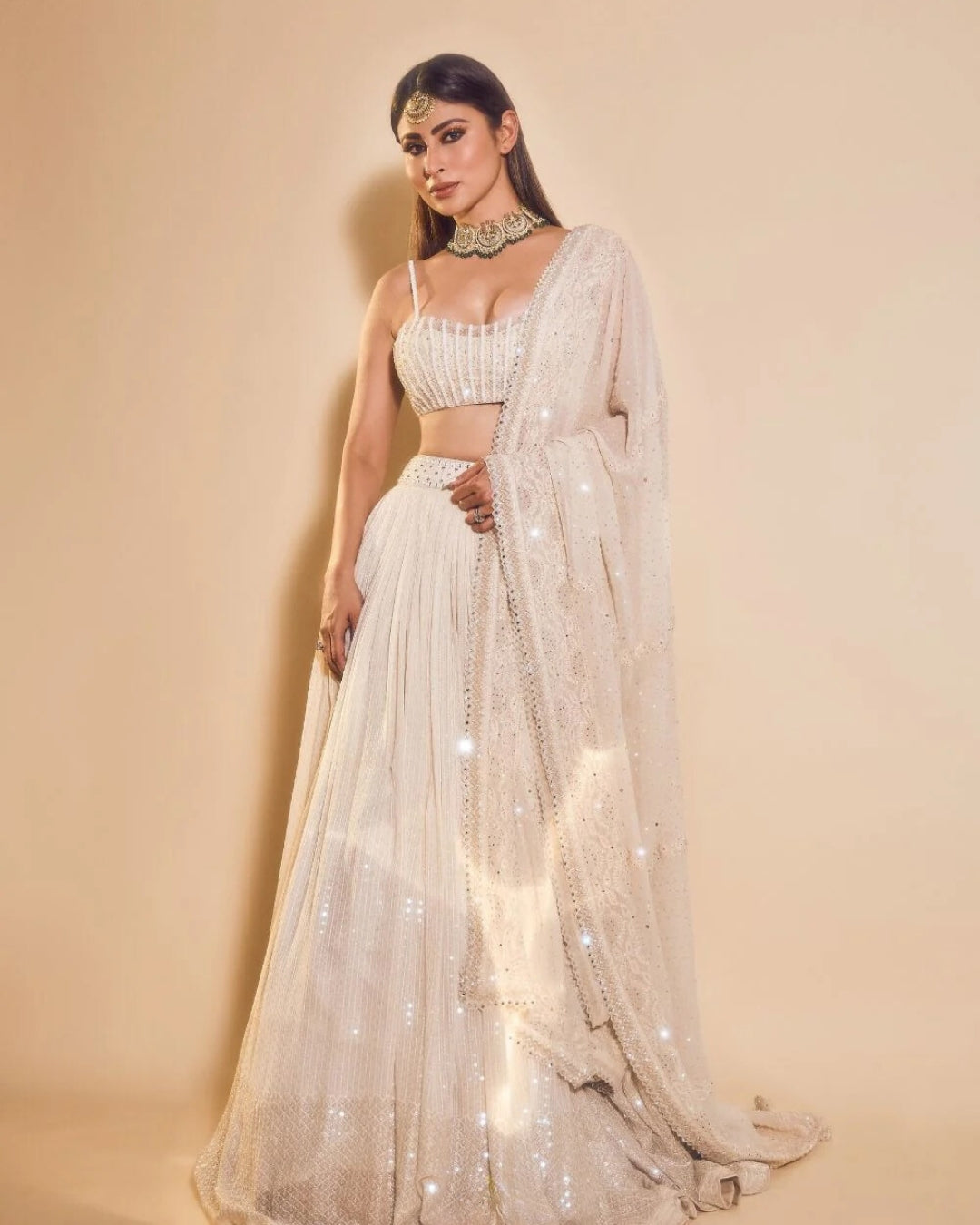 Mouni Roy Ethnic Fashion Glows in an Ivory Sequins Lehenga Set