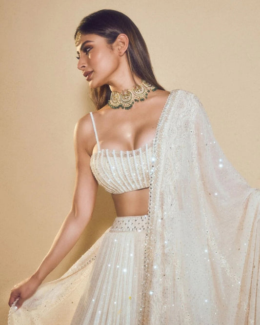 Mouni Roy Ethnic Fashion Glows in an Ivory Sequins Lehenga Set