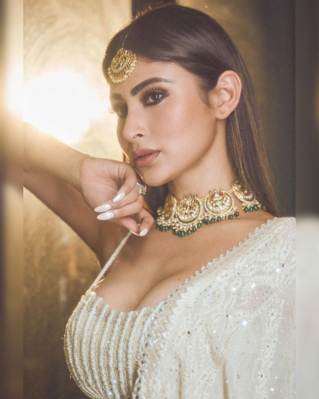 Mouni Roy Ethnic Fashion Glows in an Ivory Sequins Lehenga Set