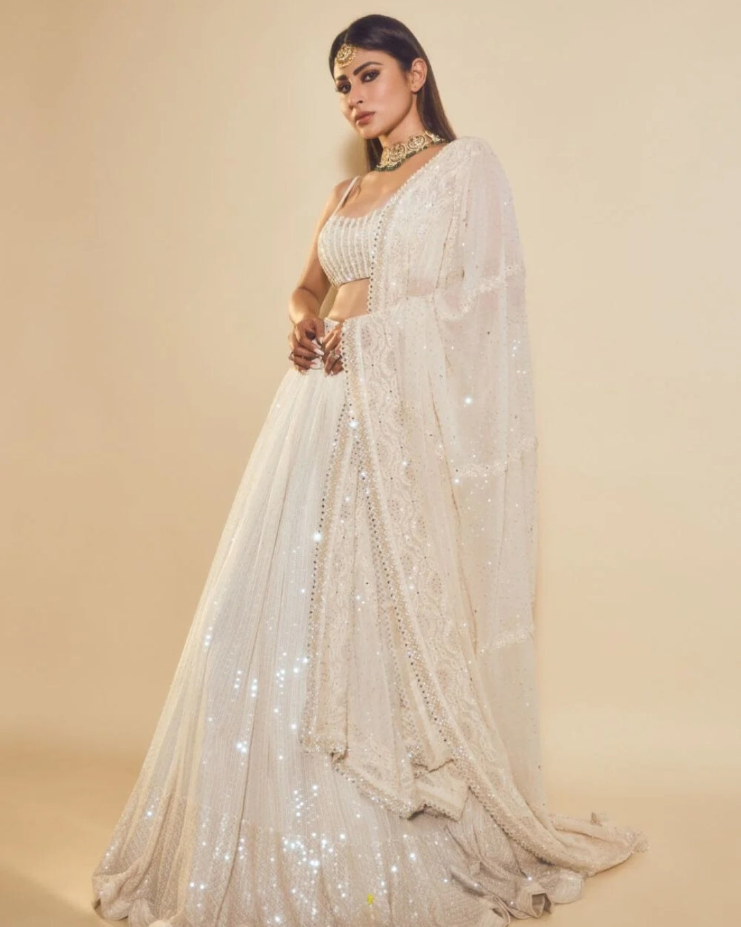 Mouni Roy Ethnic Fashion Glows in an Ivory Sequins Lehenga Set