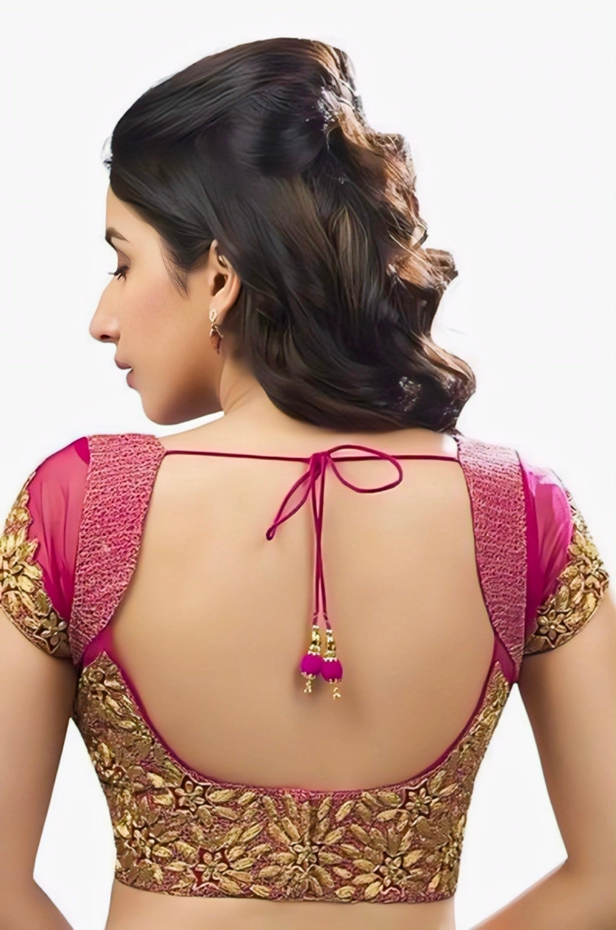 Magenta embroidered blouse with golden floral design and deep U-back featuring dori tie, perfect for bridal and festive saree looks.