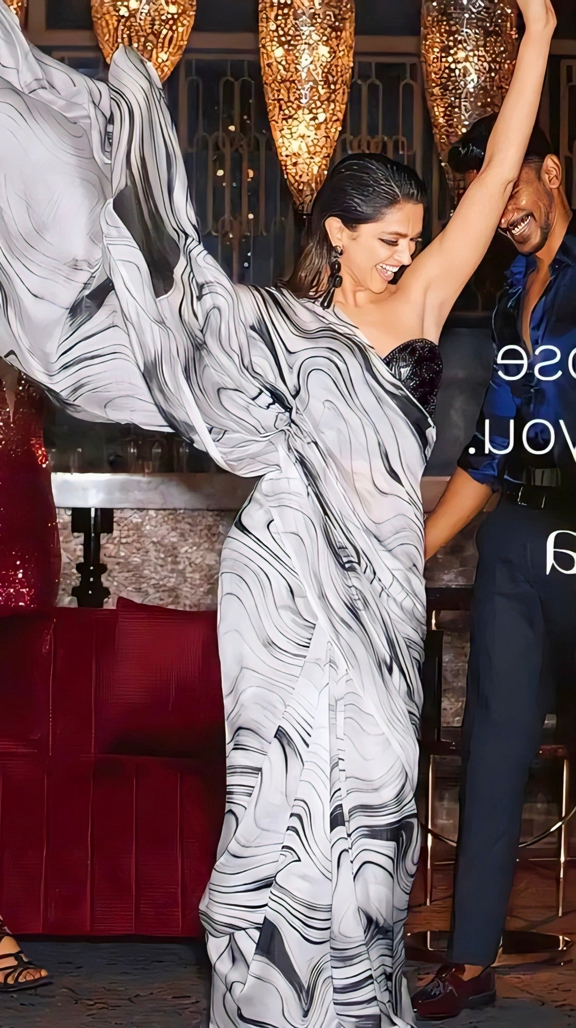 Deepika Padukone inspired black and white abstract print party wear saree