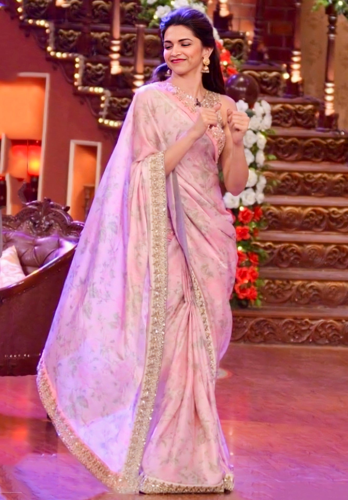 Pastel pink floral saree with sequin embellished border
