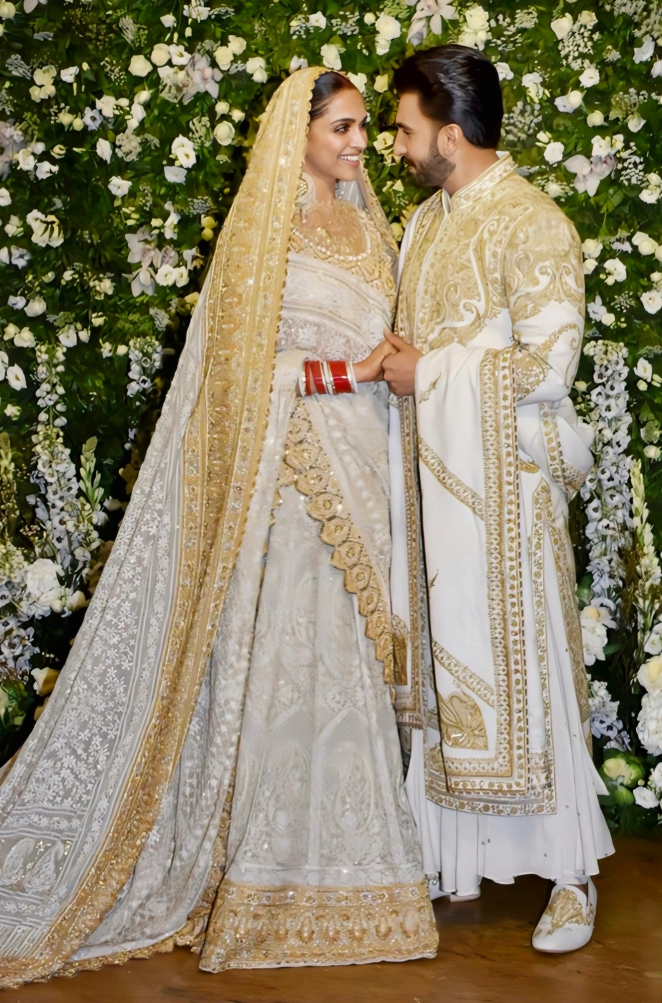 Ivory and gold embroidered bridal lehenga inspired by Deepika Padukone wedding lehenga style.