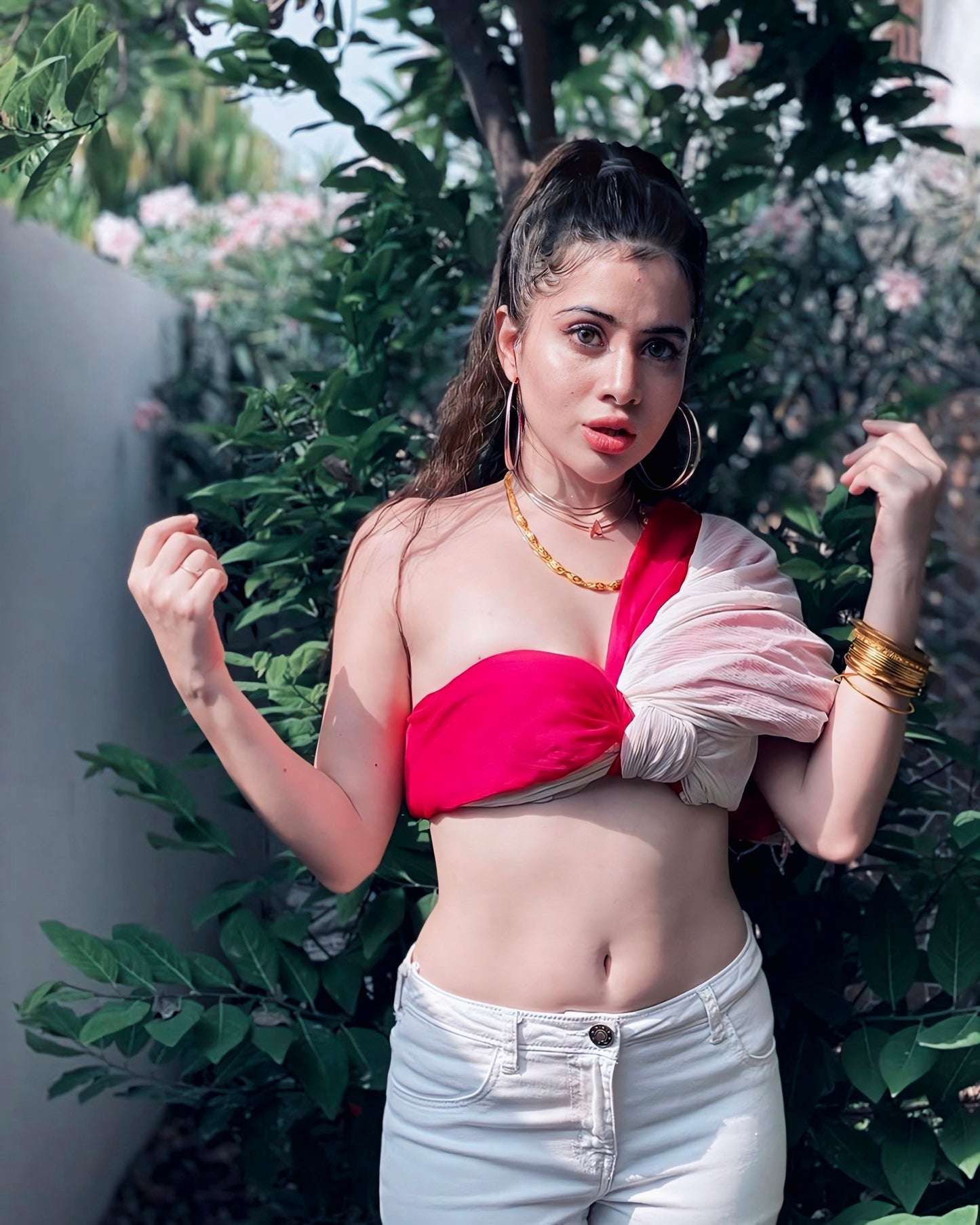 Urfi Javed inspired bold red crop top with white jeans fashion look