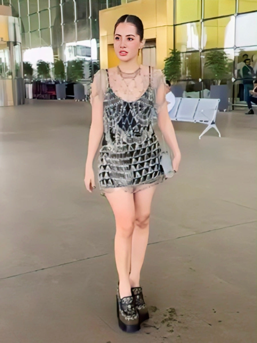 Urfi Javed safety pin dress paired with icy clear purse and platform shoes edgy couture fashion look