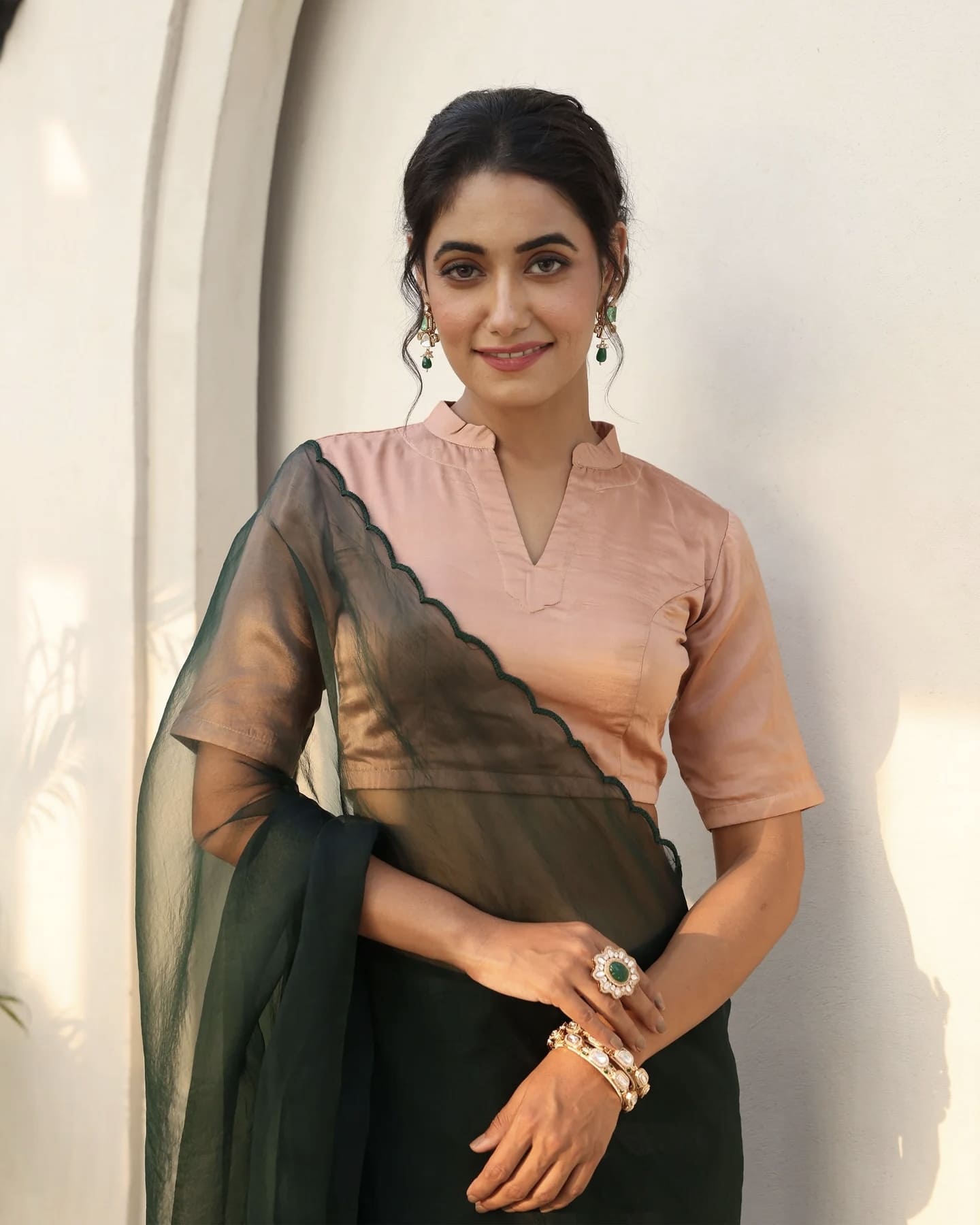 Peach Princess Cut Blouse with Notched Neck and Dark Green Sheer Pallu Finish