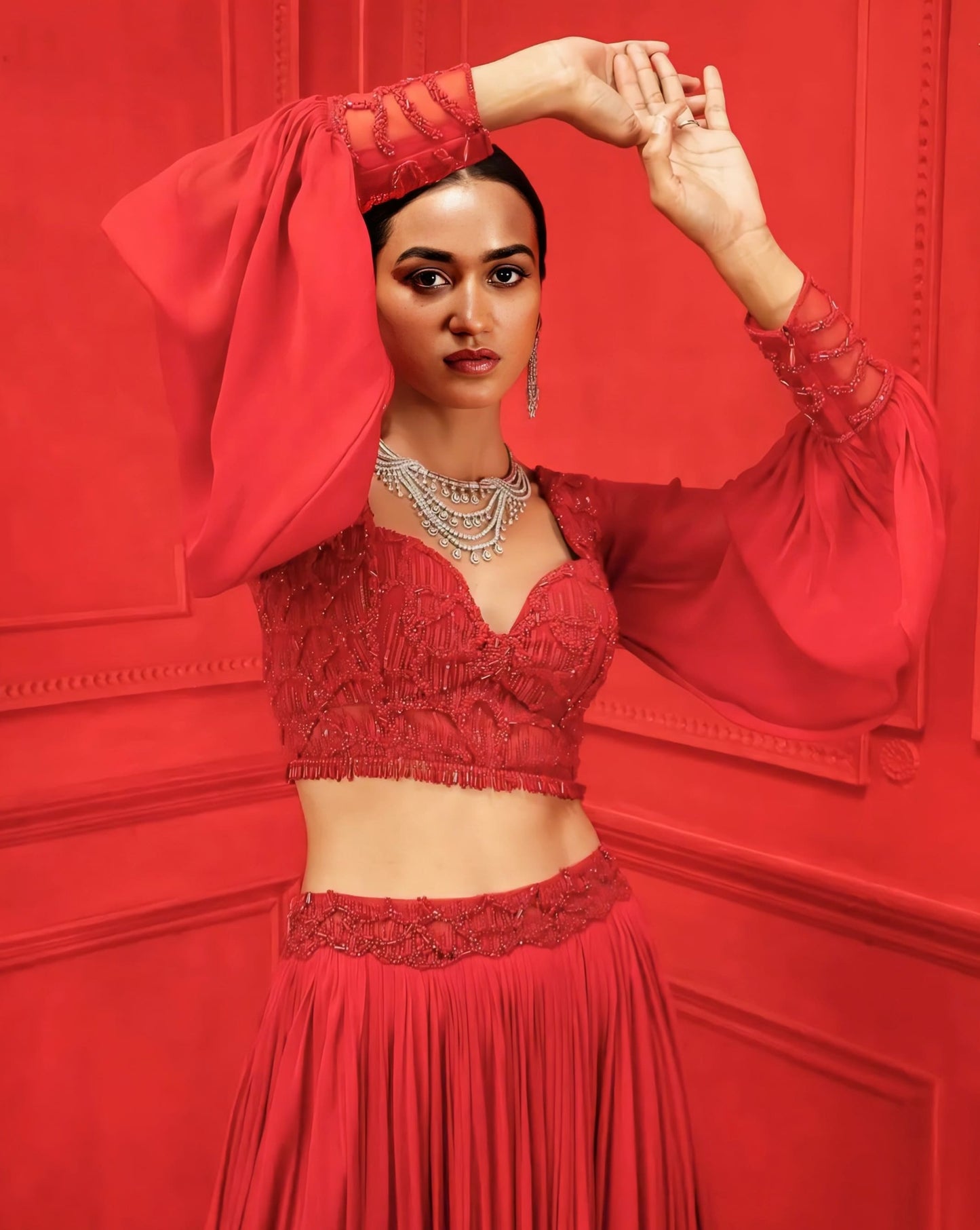 Deep red embroidered princess cut blouse with sweetheart neckline and sheer full sleeves