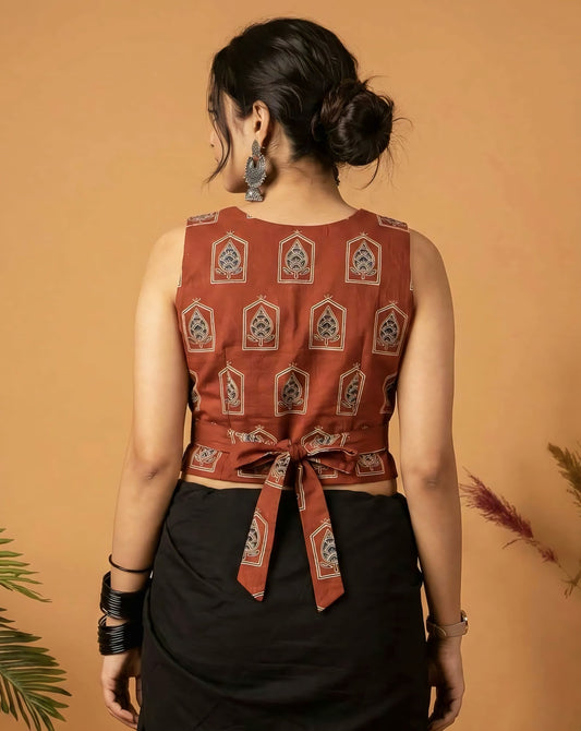 Rust Printed Fancy Blouse Design with Front Buttons – Sleeveless V-Neck Saree Blouse