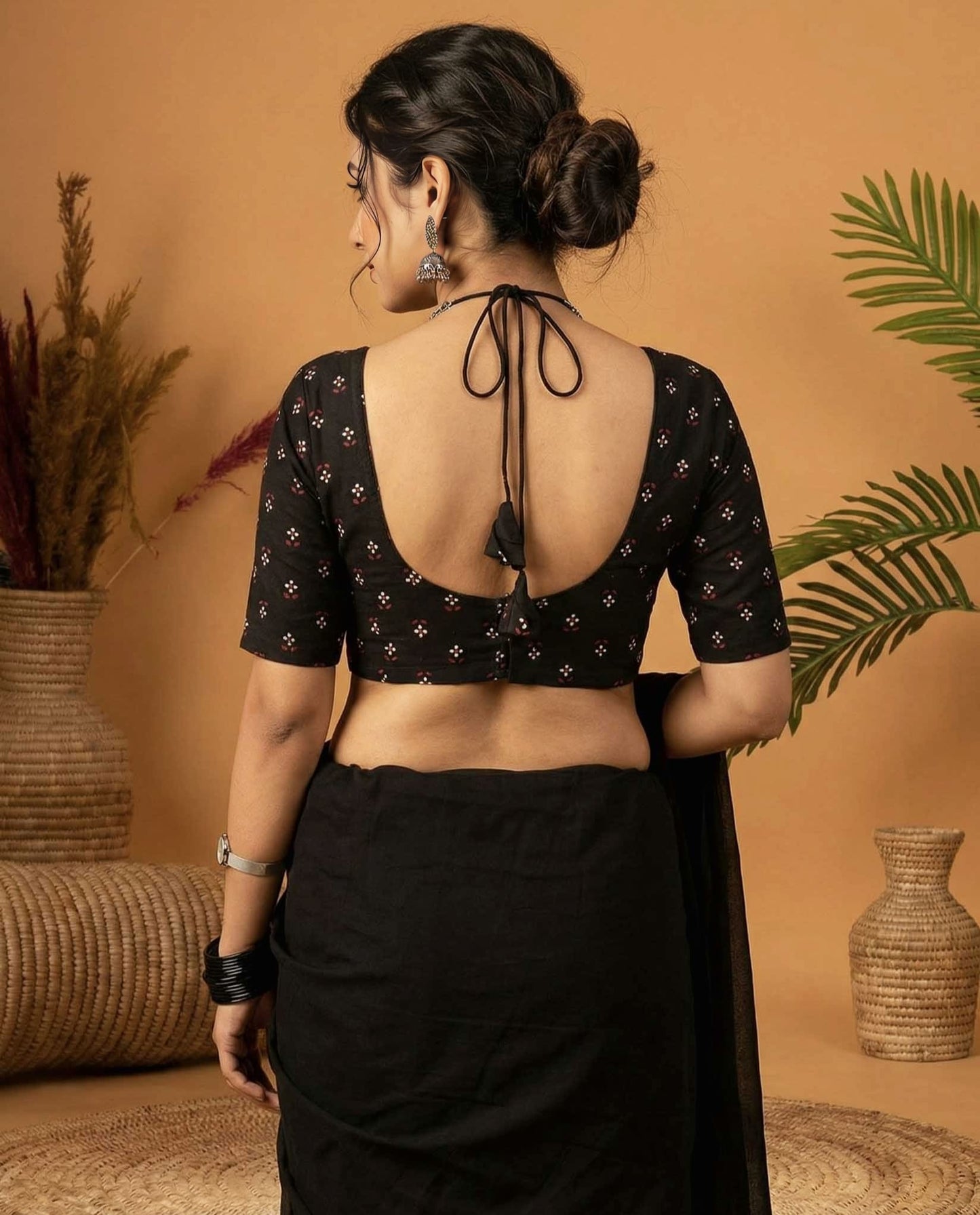 Modern Black Fancy Blouse Design with Strappy Neck & Printed Sleeves