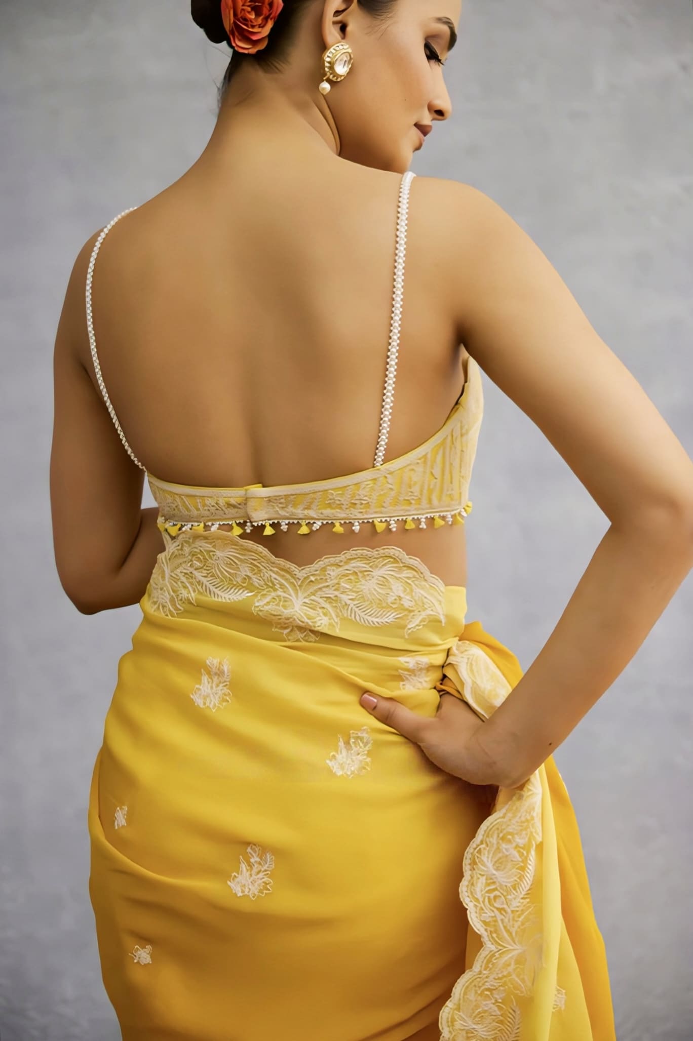 Elegant Yellow Embroidered Saree Blouse with Delicate Strap Design
