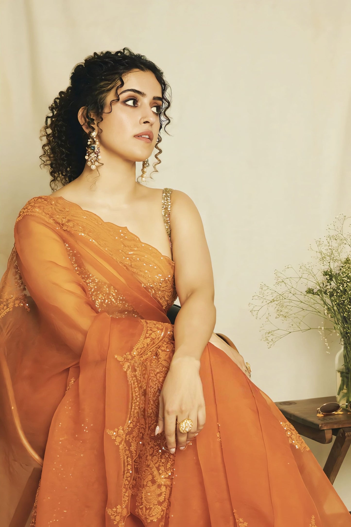 Sanya Malhotra in Santree Yuvani Guncha Saree Set – Orange Organza Embroidered Designer Saree