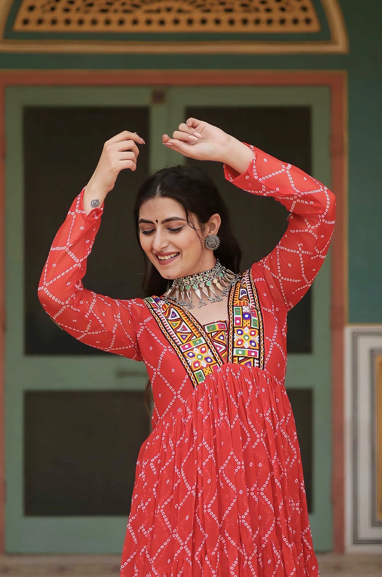 Orange Bandhani Print Georgette Gown with Embellished Kutchi Patchwork Yoke