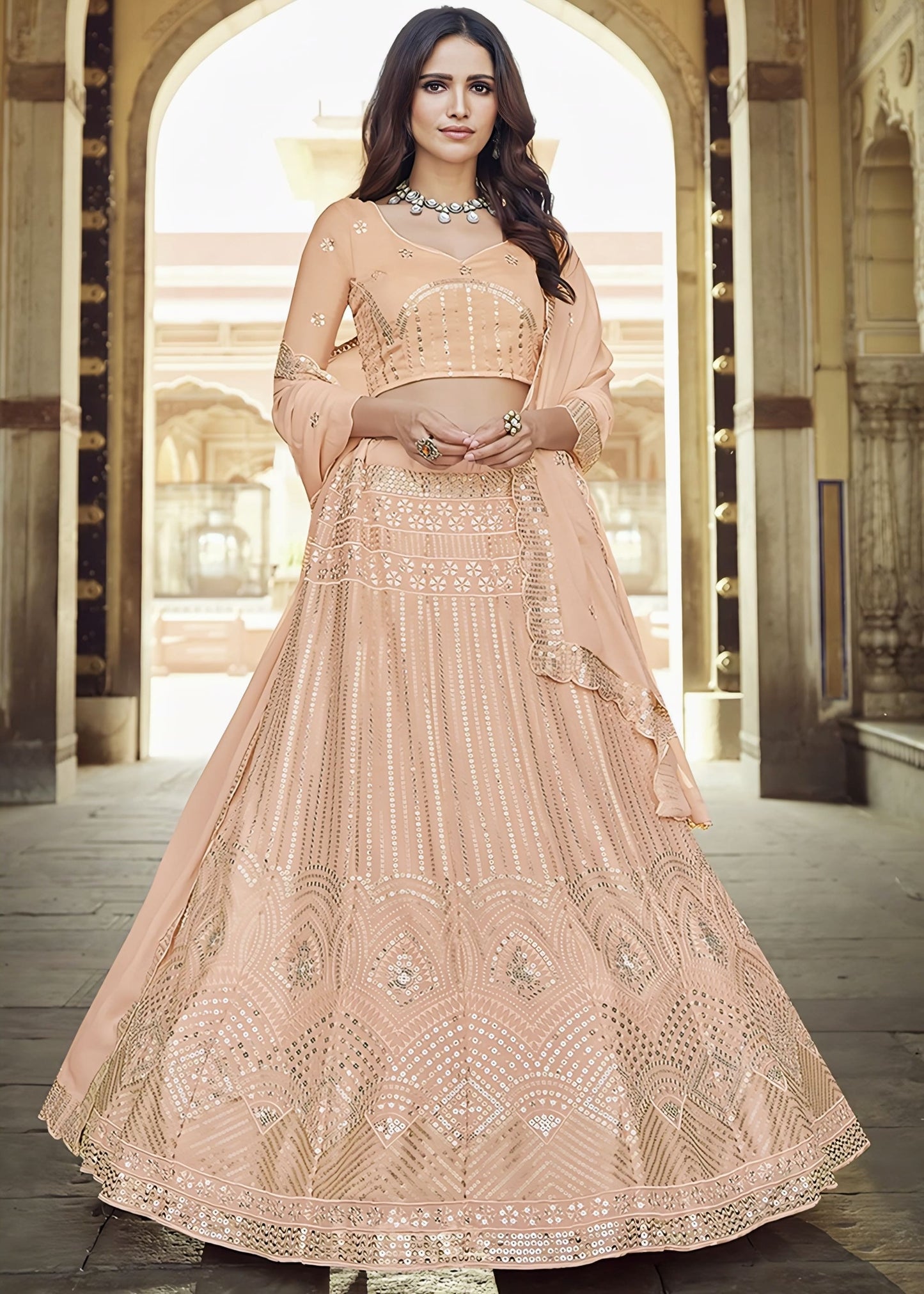 Peach festive georgette lehenga choli with sequins silver embroidery, matching choli, and scalloped border dupatta for wedding and festive wear