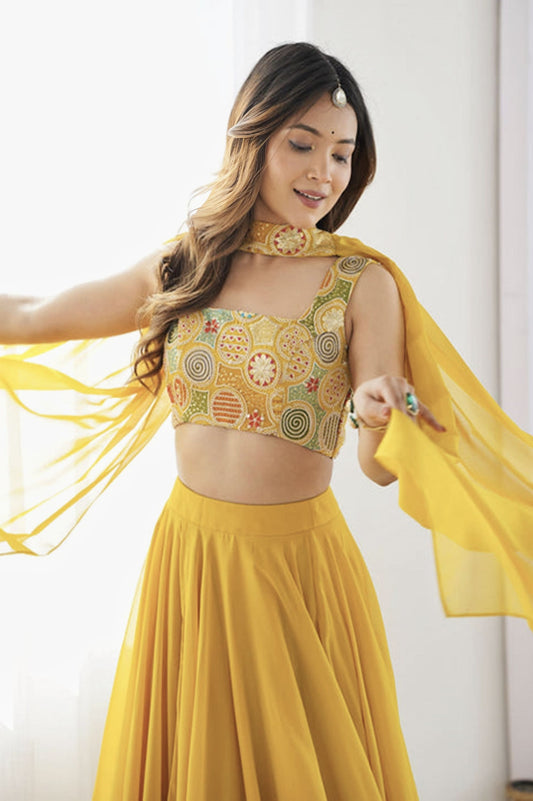 Yellow Fully Flared Fox Georgette Lehenga Choli with Intricate Embroidery
