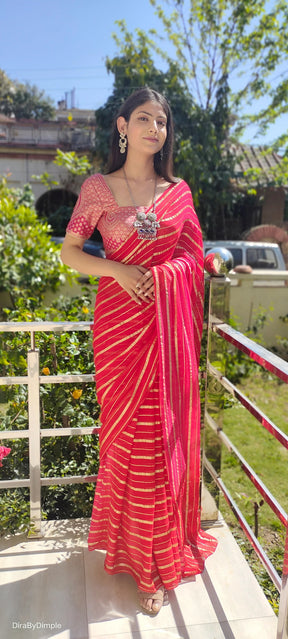 Radiant Orange-Red Georgette Saree with Silver Zari Work