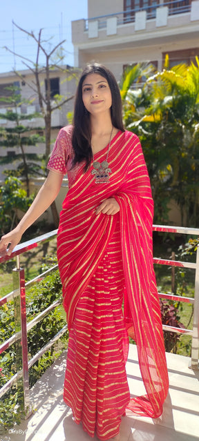 Radiant Orange-Red Georgette Saree with Silver Zari Work