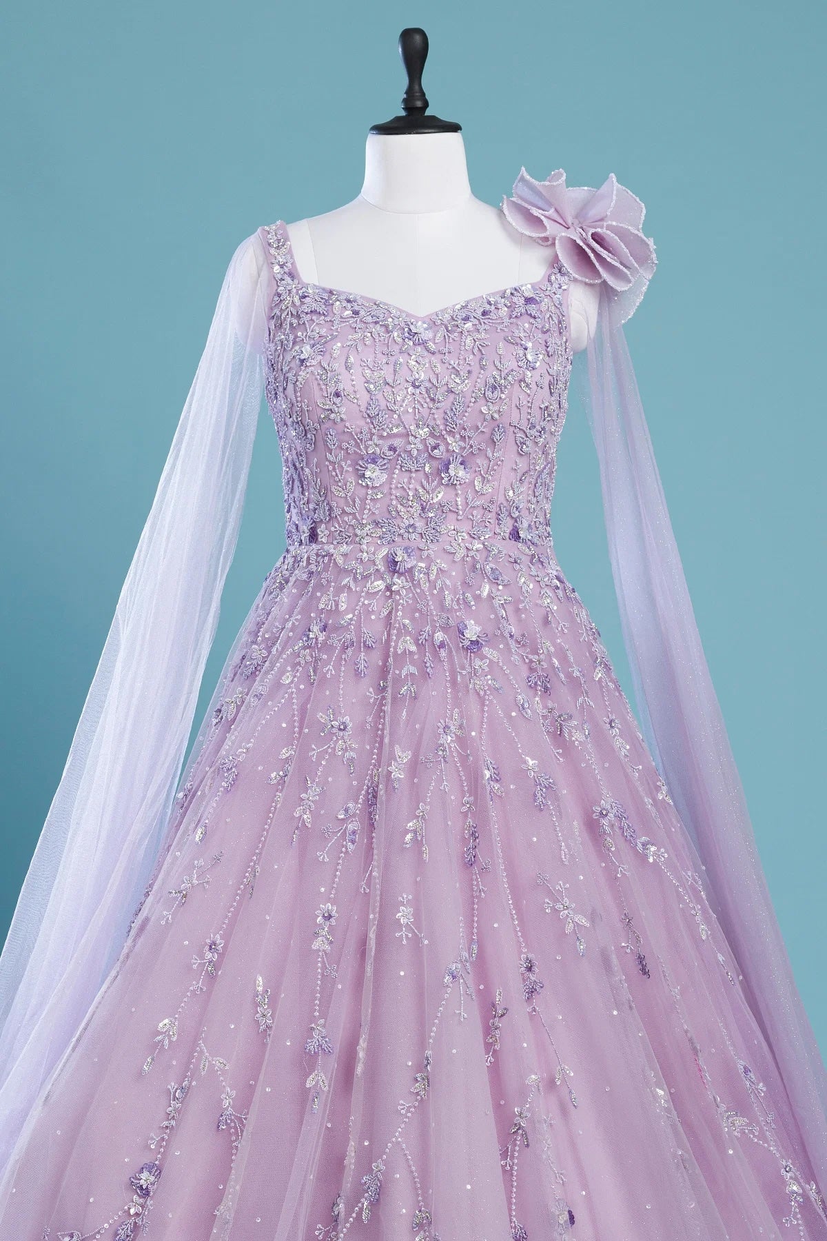 Lavender Net Flared Style Indo-Western Gown with Slit Sleeves Lavender Net Flared Style Indo-Western Gown with Slit Sleeves
