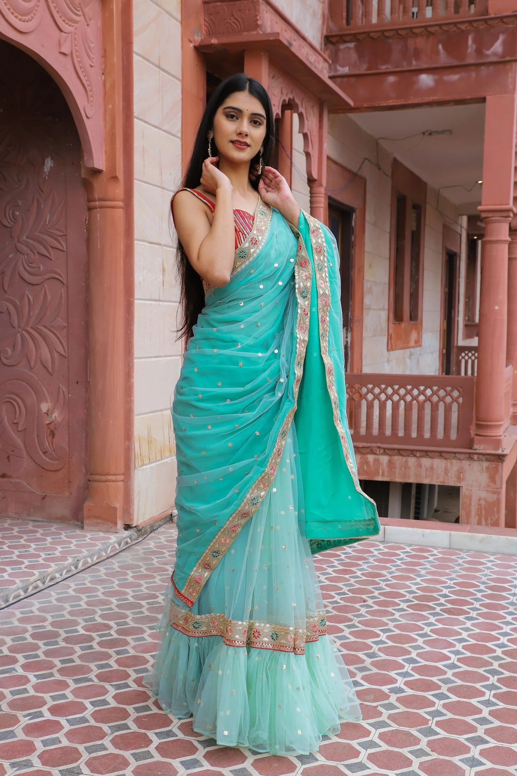 Green Ruffled Net and Georgette Half-N-Half Saree with Sequin Work