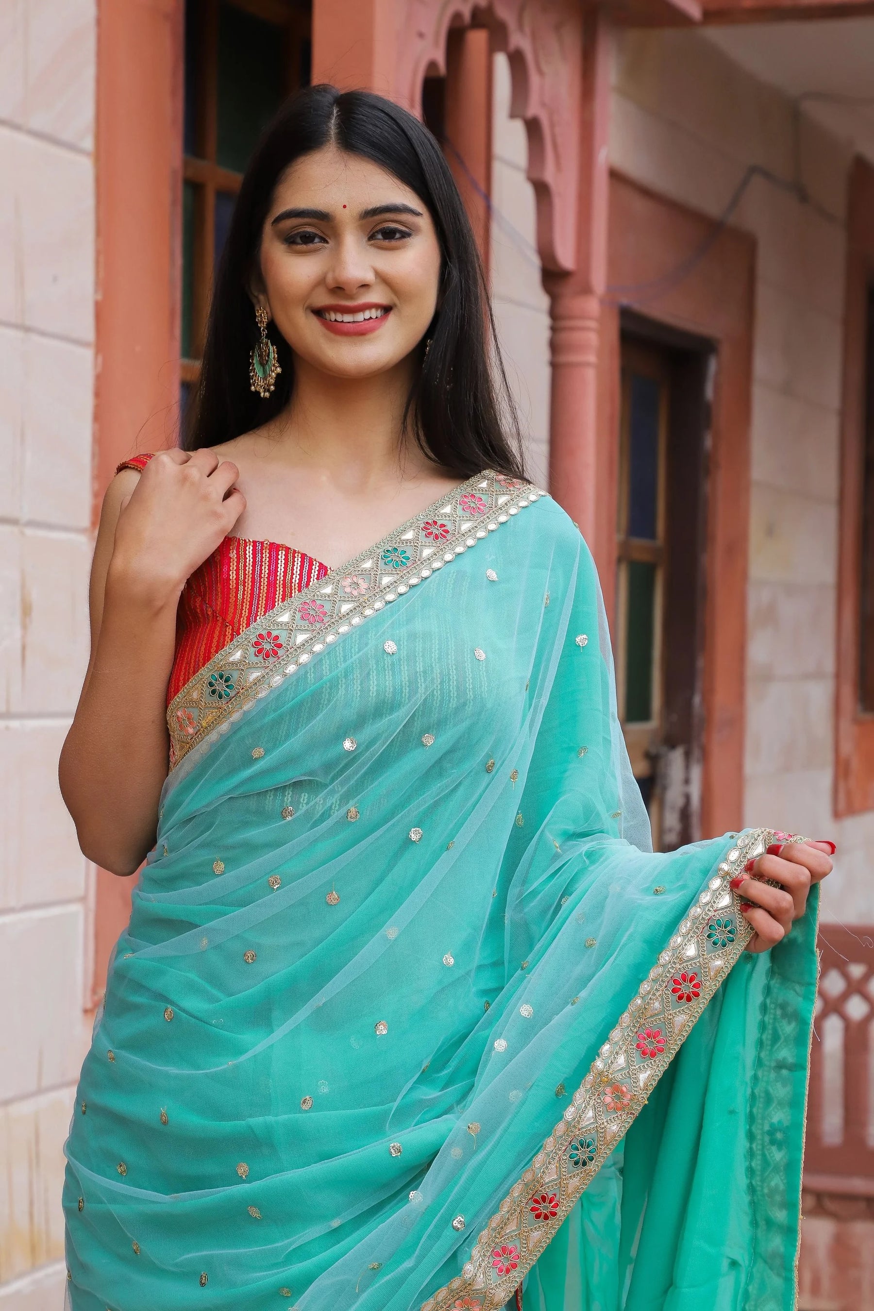 Green Ruffled Net and Georgette Half-N-Half Saree with Sequin Work