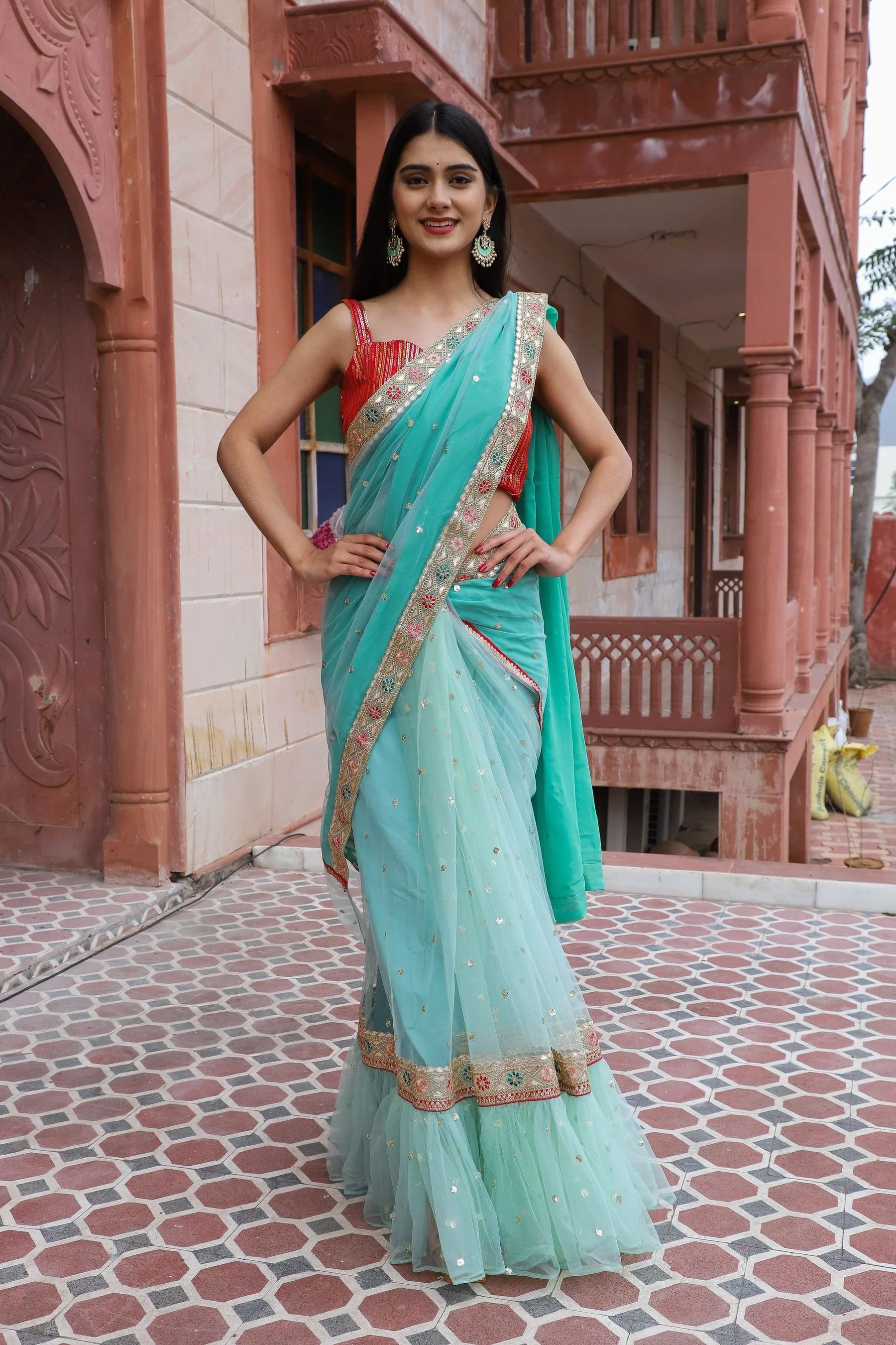 Green Ruffled Net and Georgette Half-N-Half Saree with Sequin Work