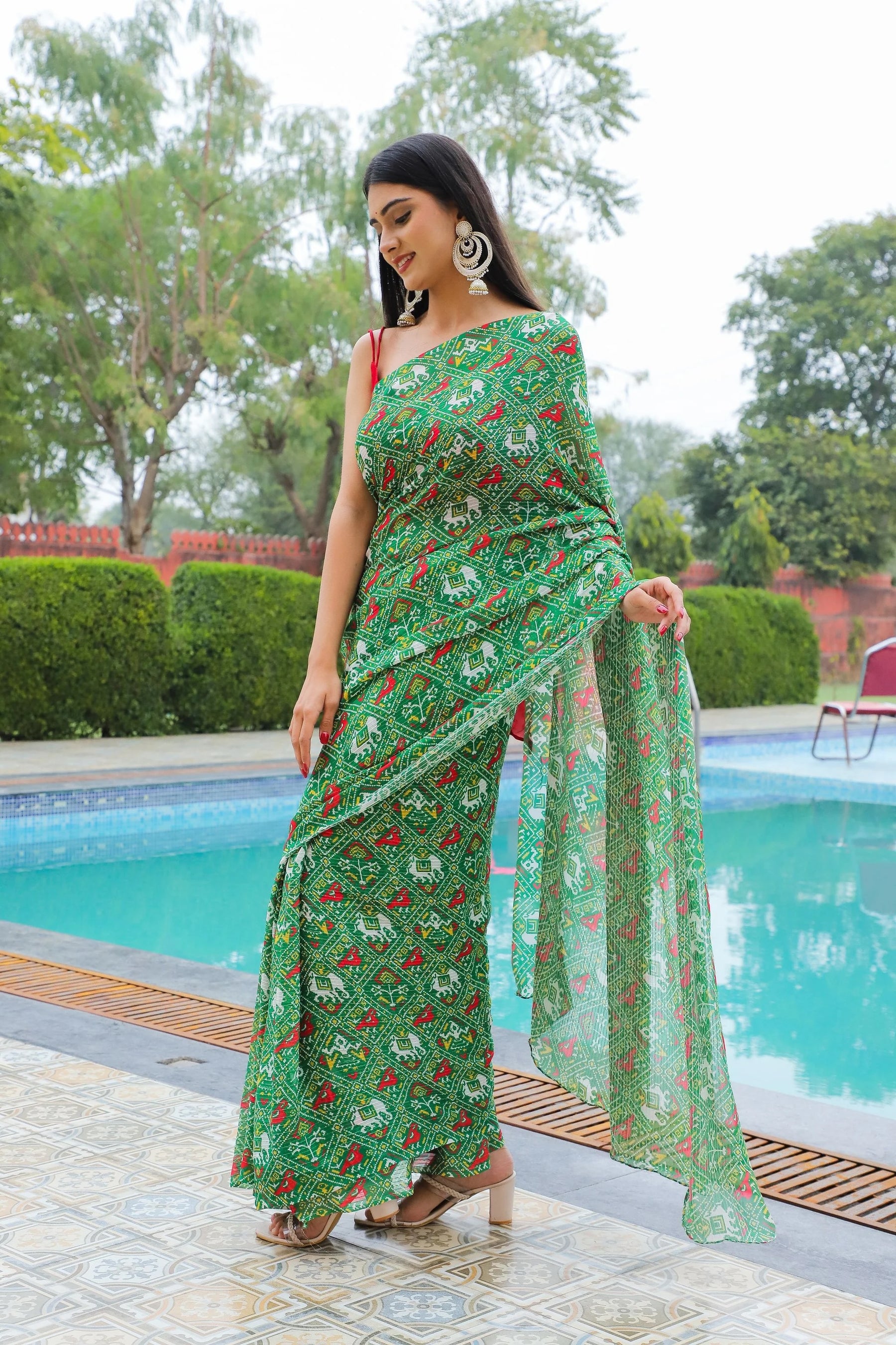 Festive Patola Printed Georgette Saree with Sequins and Thread Work