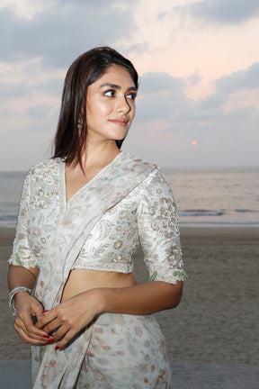 Mrunal Thakur in Flamboyance Net Embroidered Blouse and Ruffled Chiffon Saree