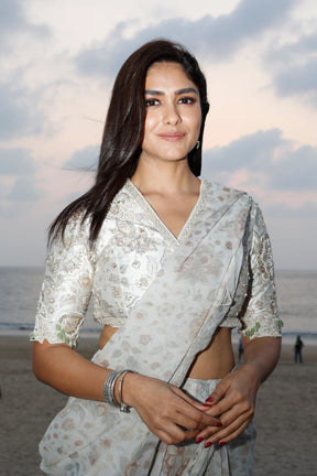 Mrunal Thakur in Flamboyance Net Embroidered Blouse and Ruffled Chiffon Saree