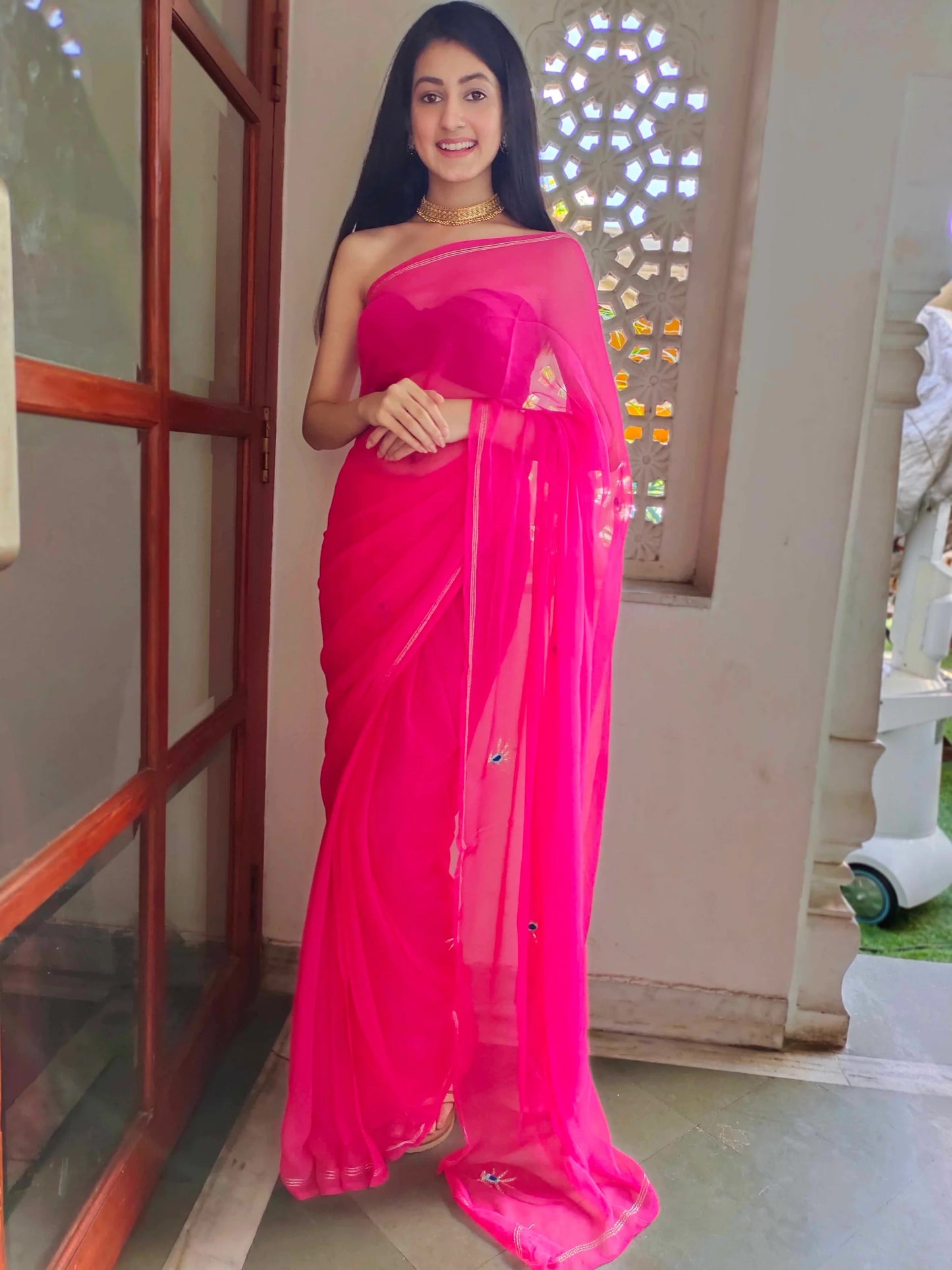 Heavenly Rani Chiffon Saree with Zari Buttis and Royal Peacock Blouse