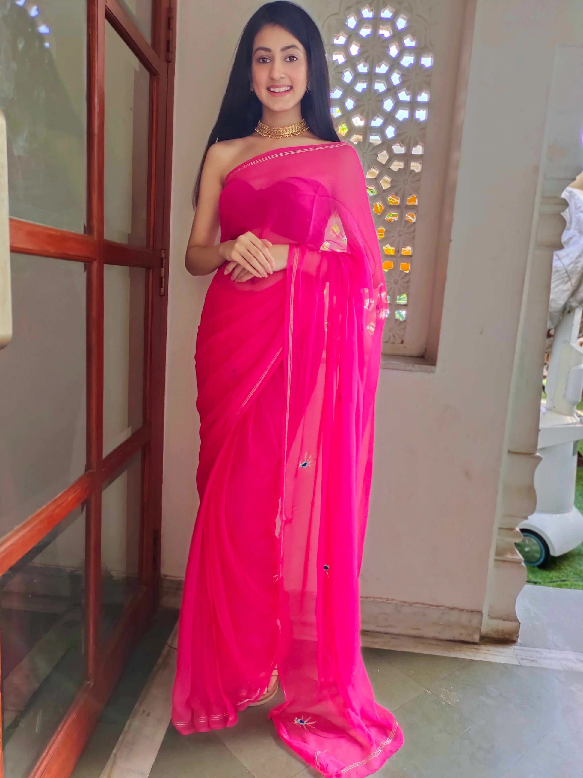 Heavenly Rani Chiffon Saree with Zari Buttis and Royal Peacock Blouse