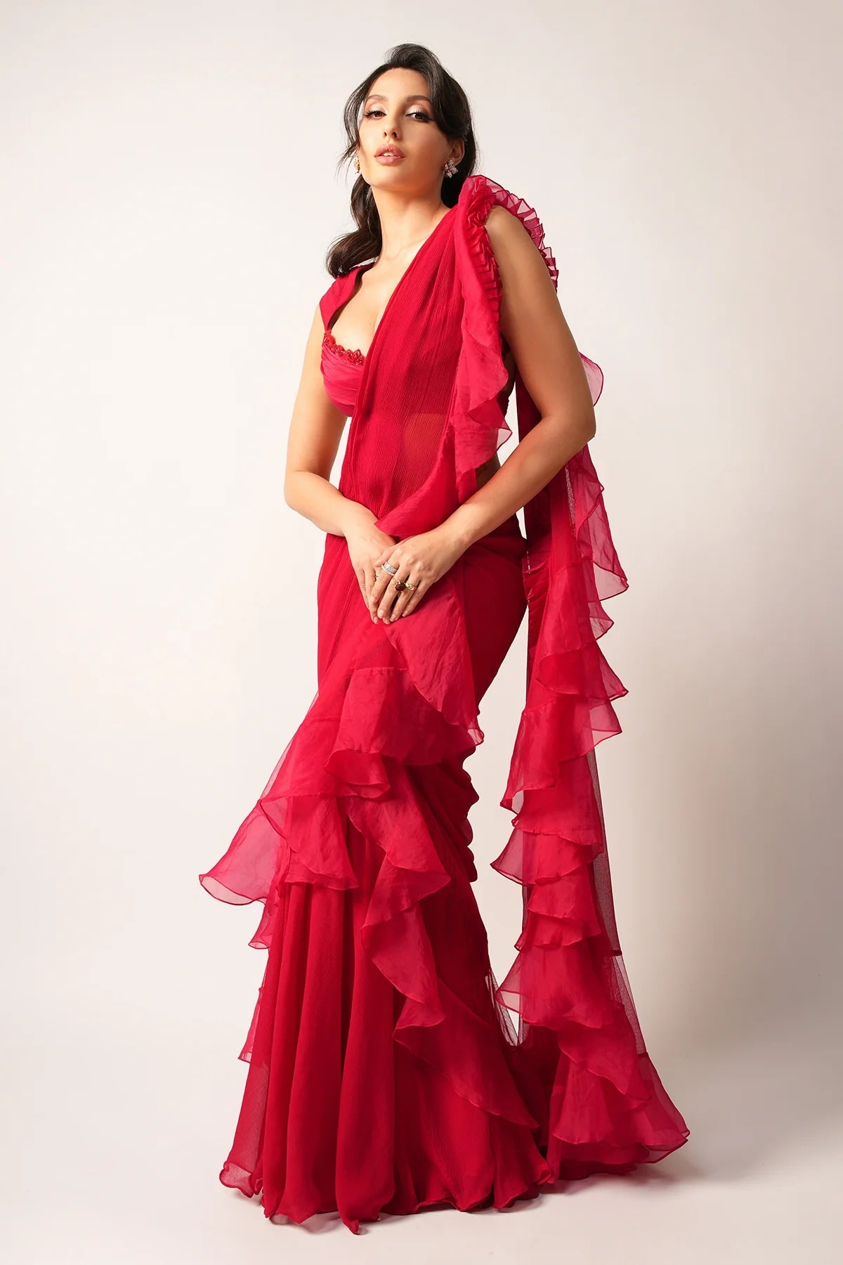 Nora Fatehi in Red Monotone Organza Double Draped Ruffled Saree