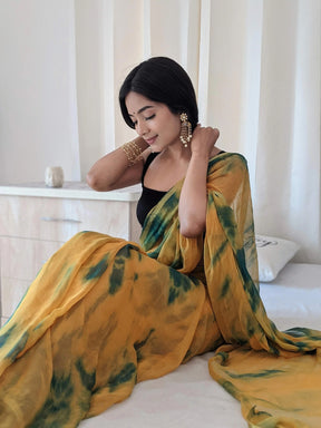 Sunset-Inspired Shibori Chiffon Saree in Orange and Deep Green