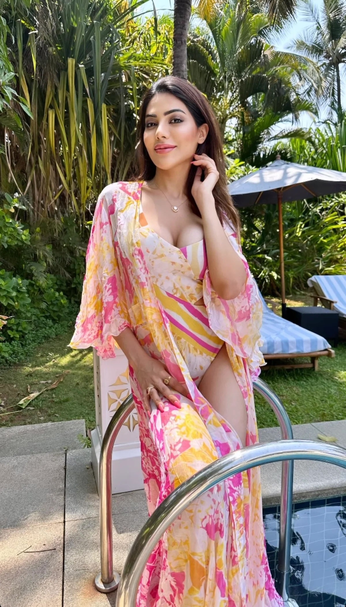 Nikki Tamboli in Orchid & Daisy Bodysuit with Cape