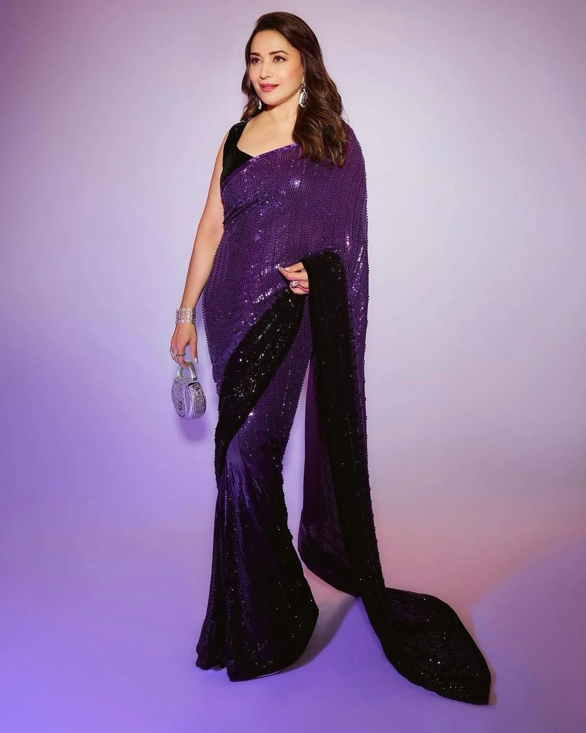 Madhuri Dixit Exudes Elegance in a Royal Purple to Black Ombré Saree