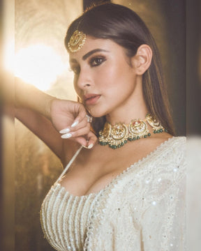 Mouni Roy  Ethnic Fashion Glows in an Ivory Sequins Lehenga Set