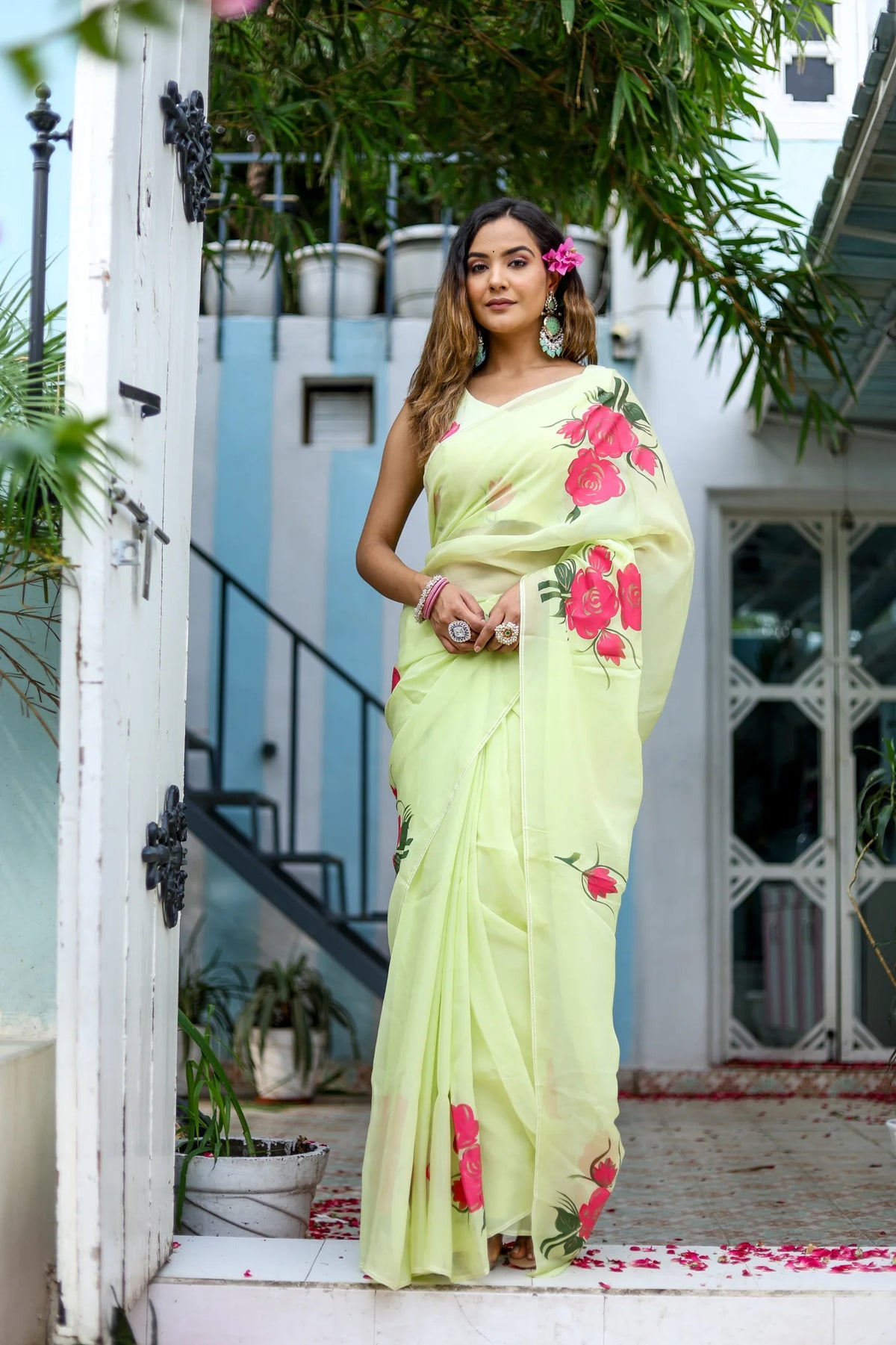 Hand painted Organza Saree with Floral Designs and Golden Highlights