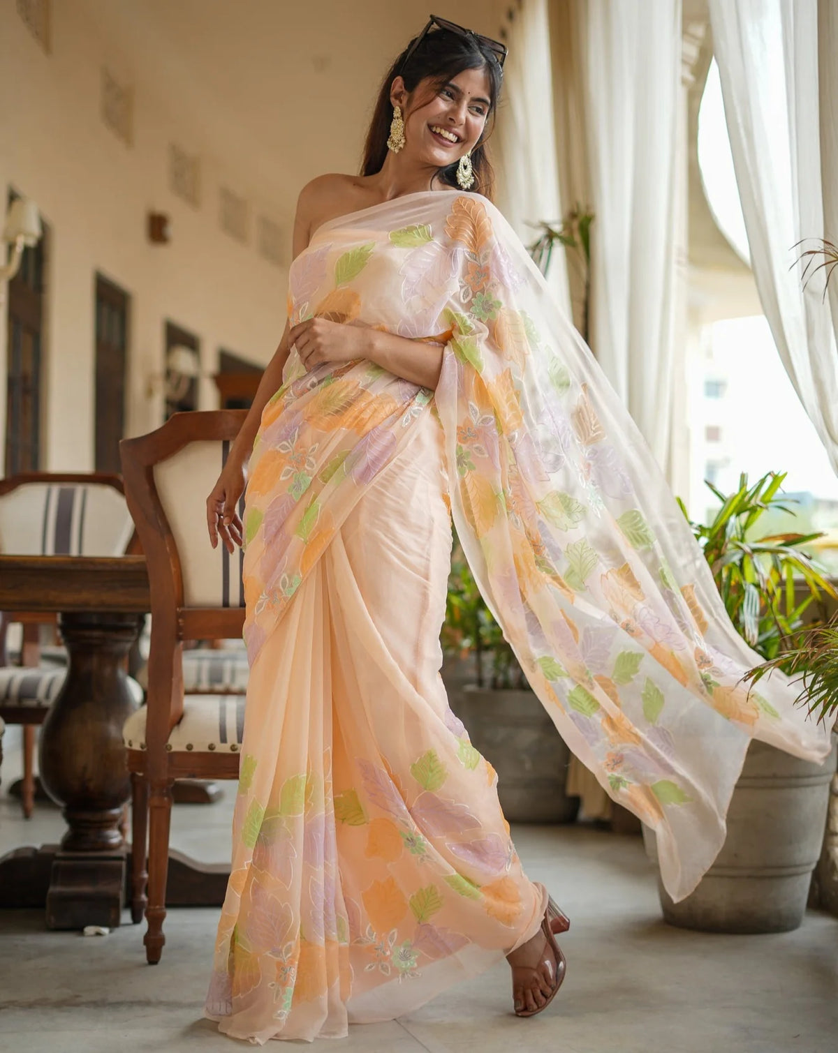 Peach Delight painted Designs Chiffon Saree