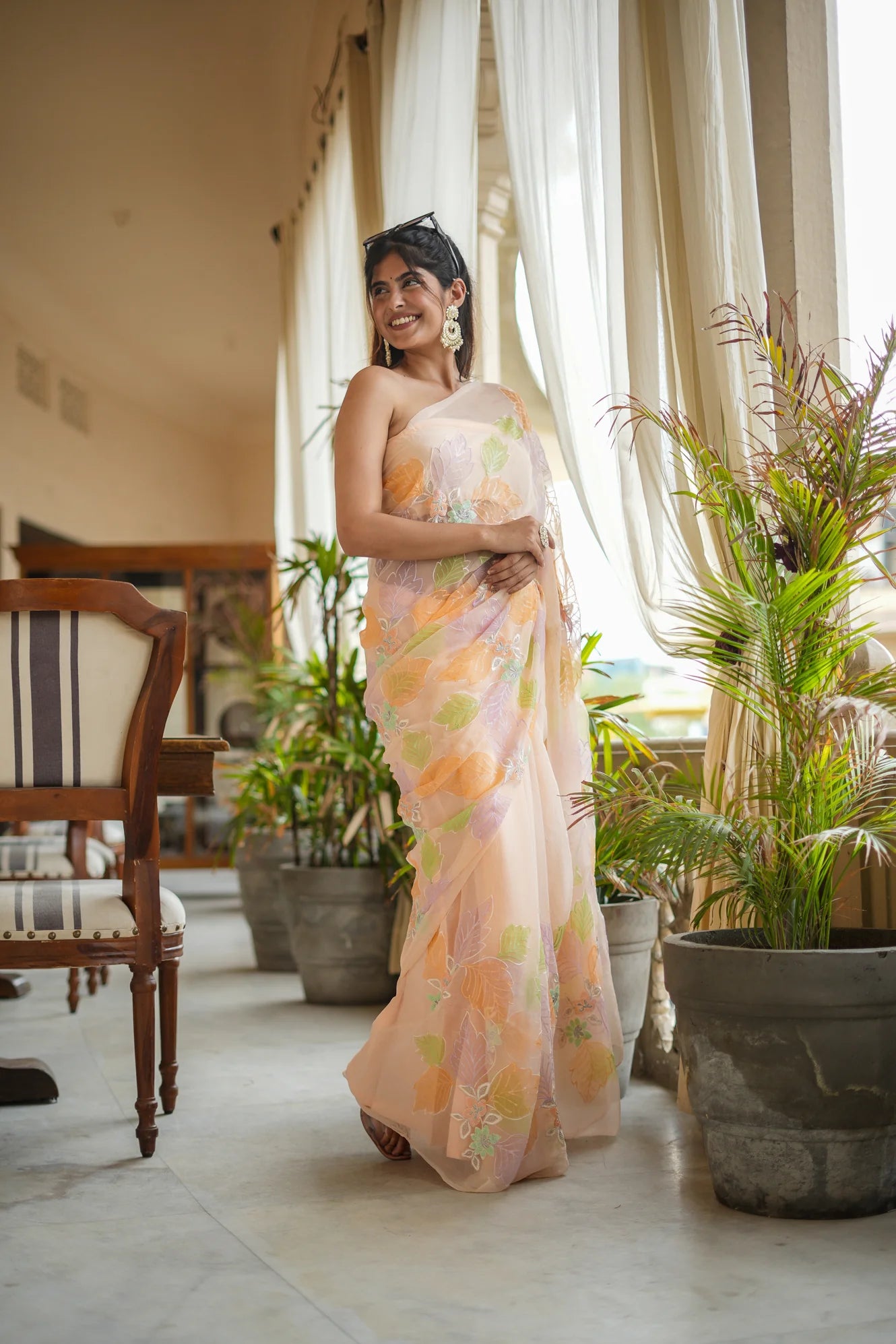 Peach Delight painted Designs Chiffon Saree