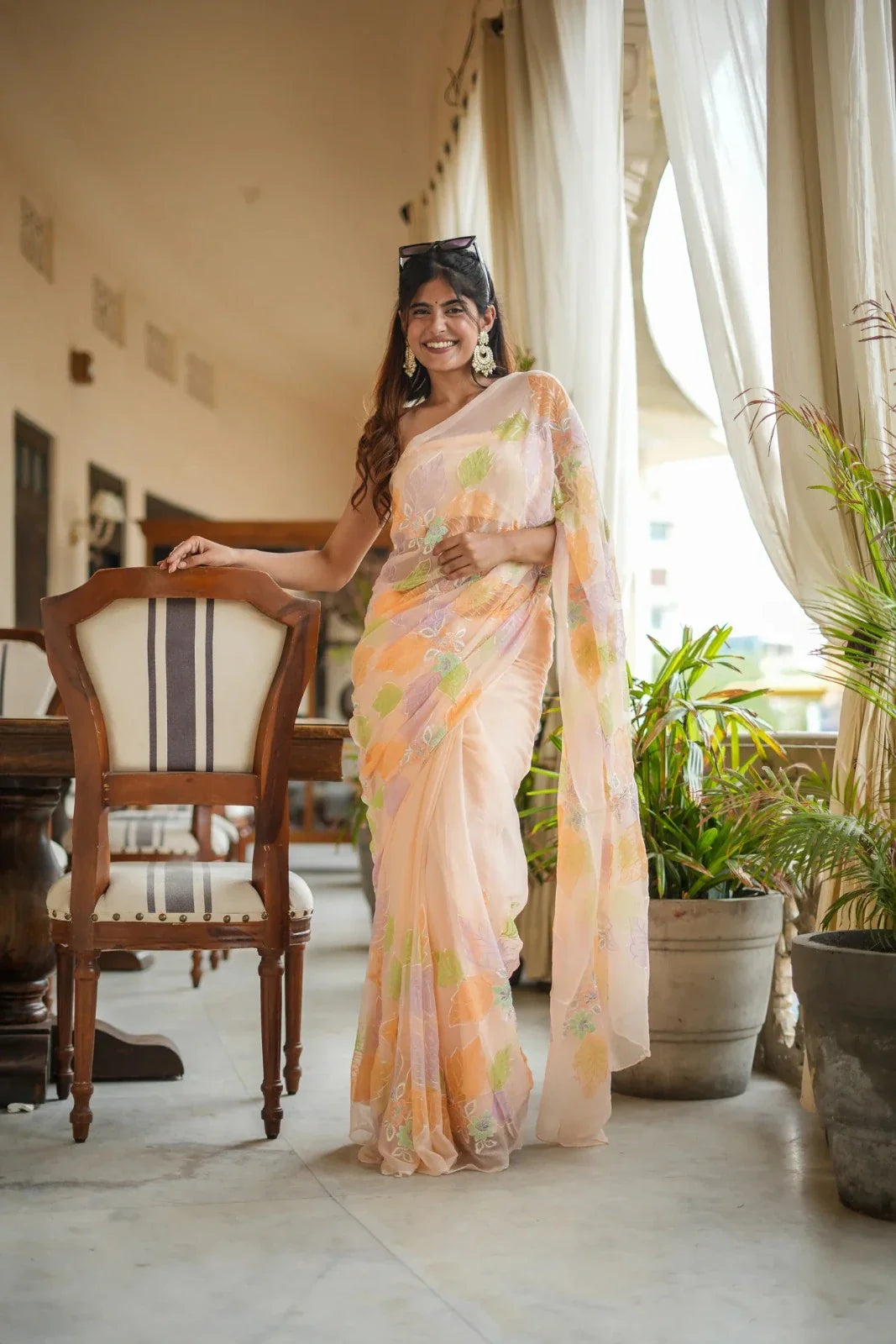 Peach Delight painted Designs Chiffon Saree