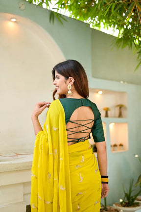 Radiant Yellow Georgette with Celestial Bird Embroidery Saree