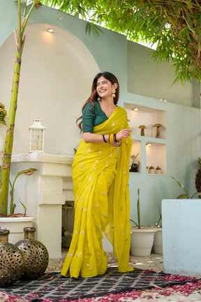 Radiant Yellow Georgette with Celestial Bird Embroidery Saree