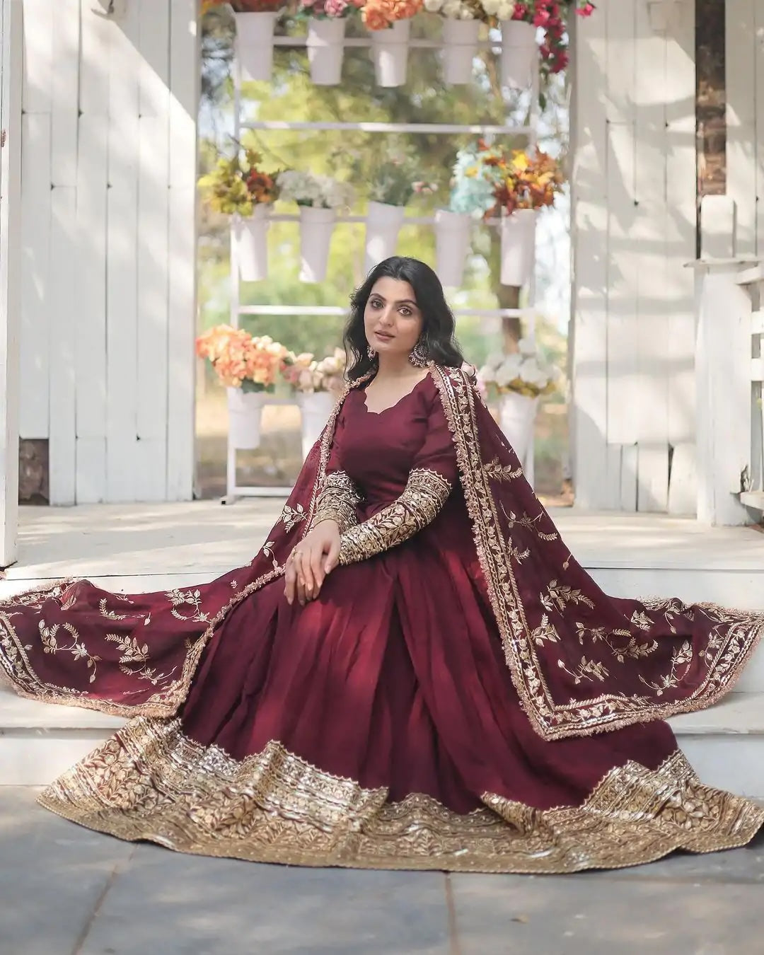 Superb Maroon Georgette Gown with Embroidery and Sequence