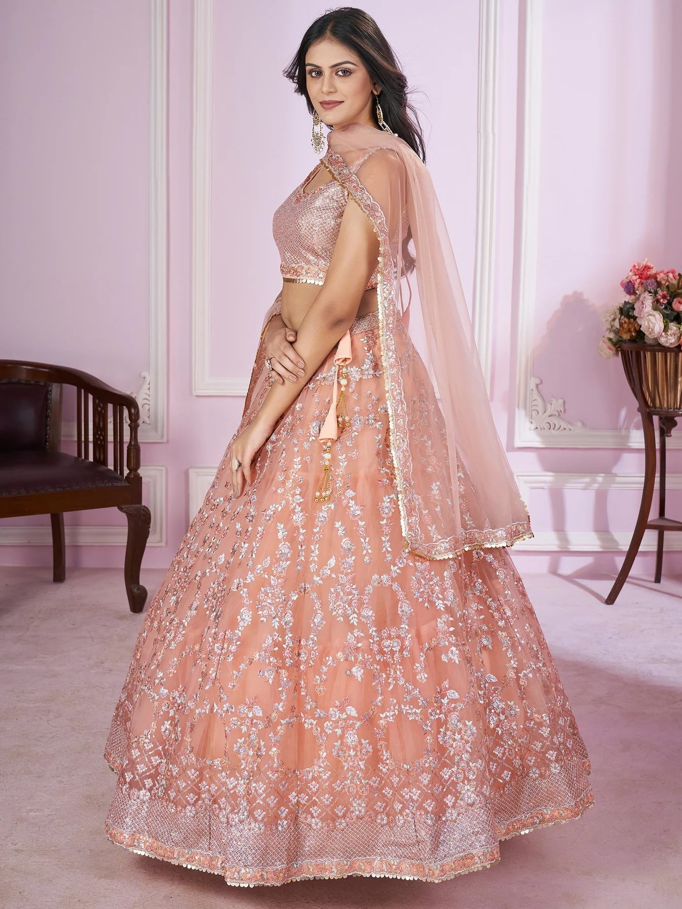 Stunning Peach Sequins Net Bridesmaid Lehenga Choli with Dupatta