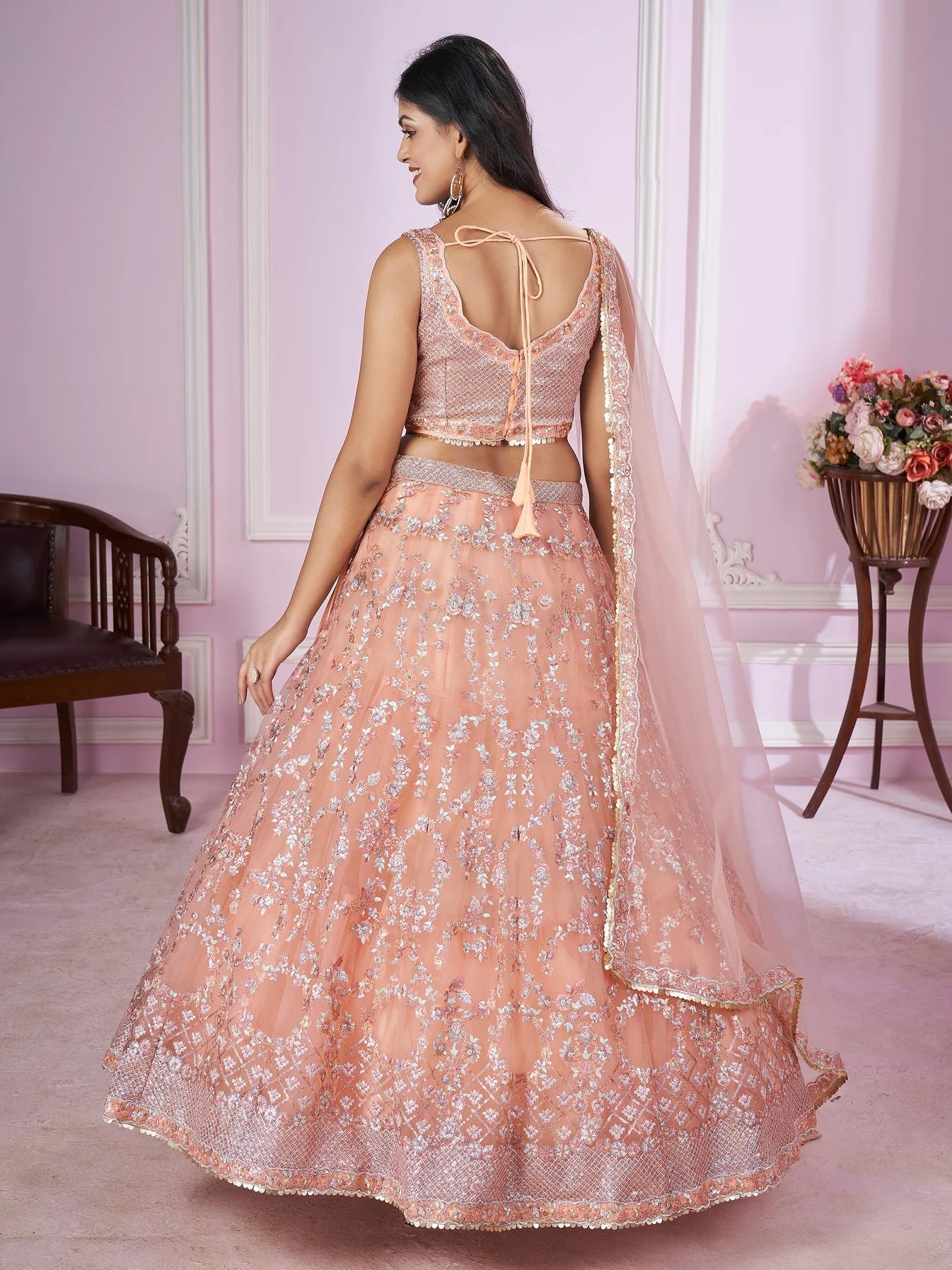 Stunning Peach Sequins Net Bridesmaid Lehenga Choli with Dupatta