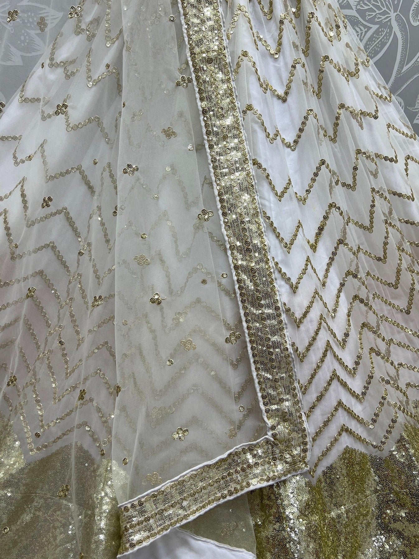 Magnetic White Sequins Net Lehenga Choli with Dupatta