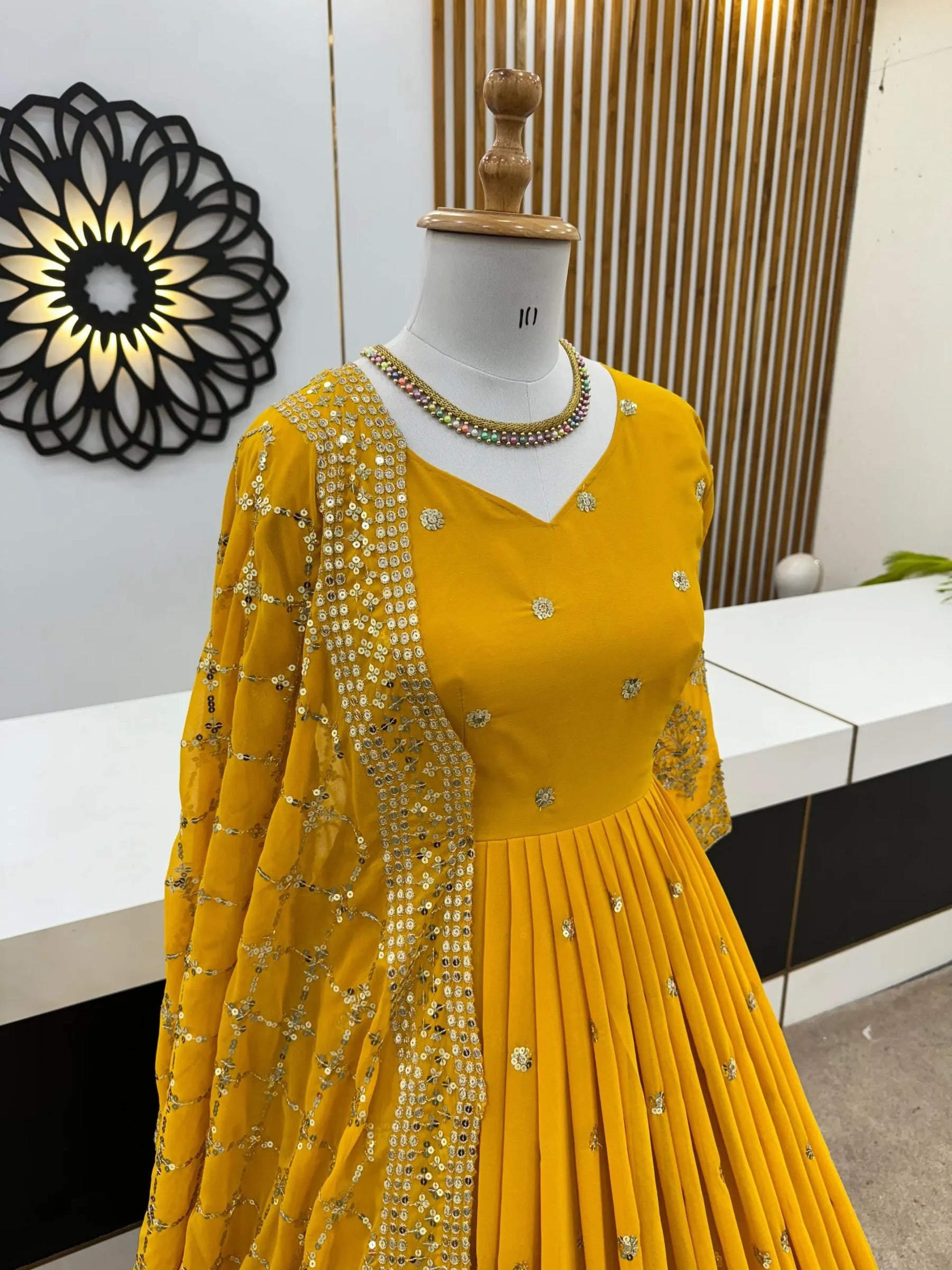 Graceful Yellow Georgette Gown with Embroidery and Sequence Work