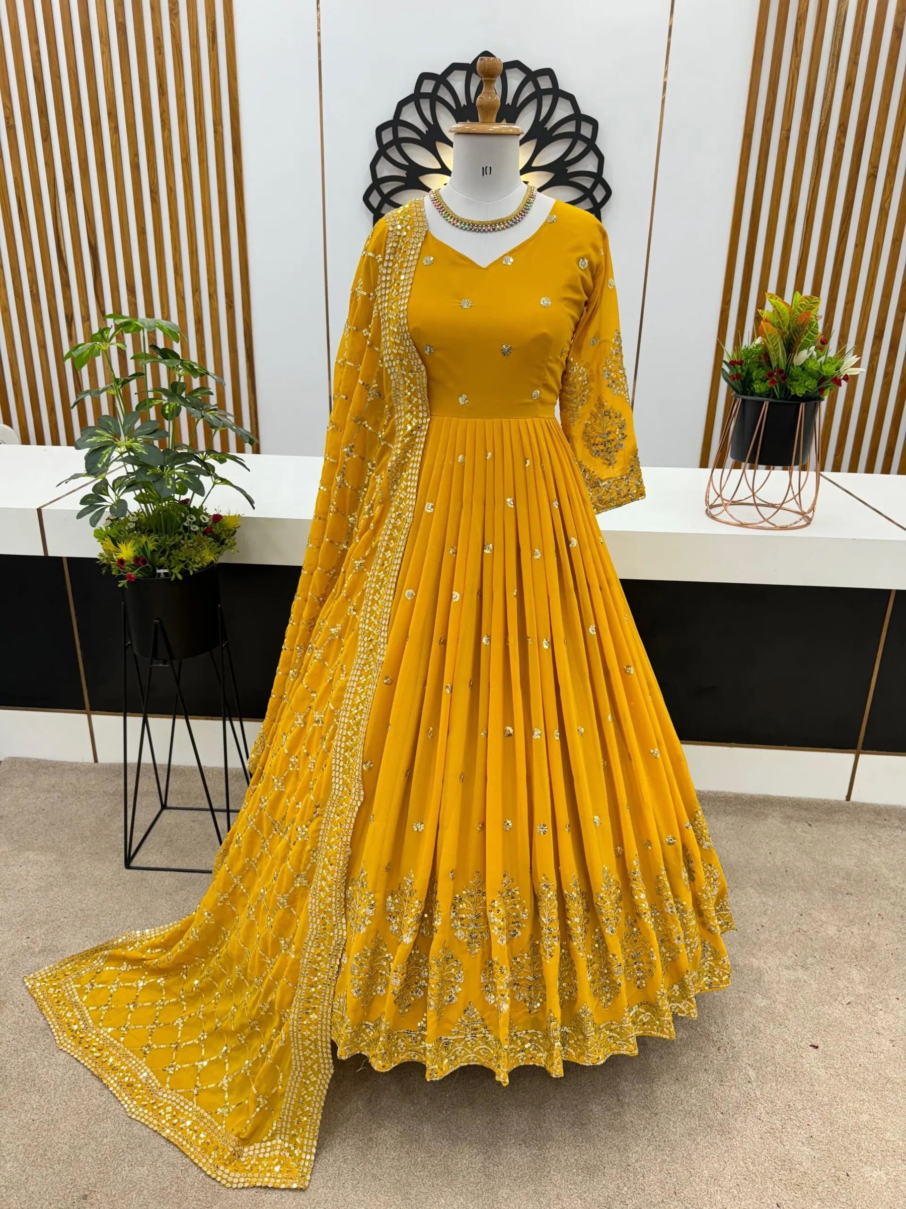 Graceful Yellow Georgette Gown with Embroidery and Sequence Work