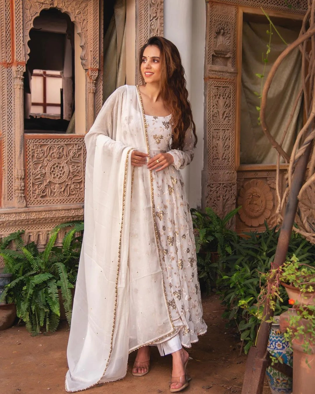 Superb White Georgette Gown with Embroidery and Sequence Work