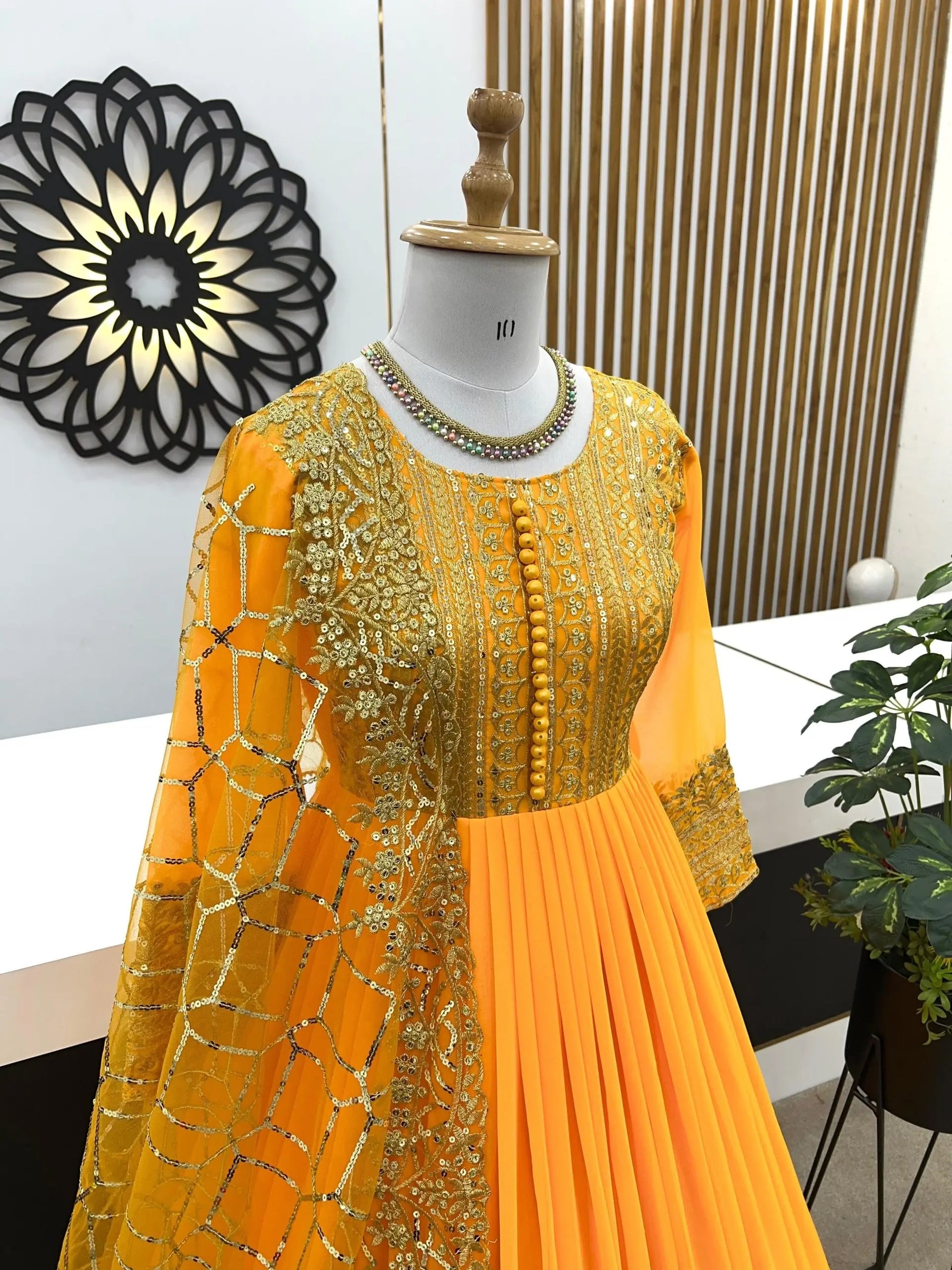 Elegant Yellow Georgette Gown with Embroidery and Sequence Work