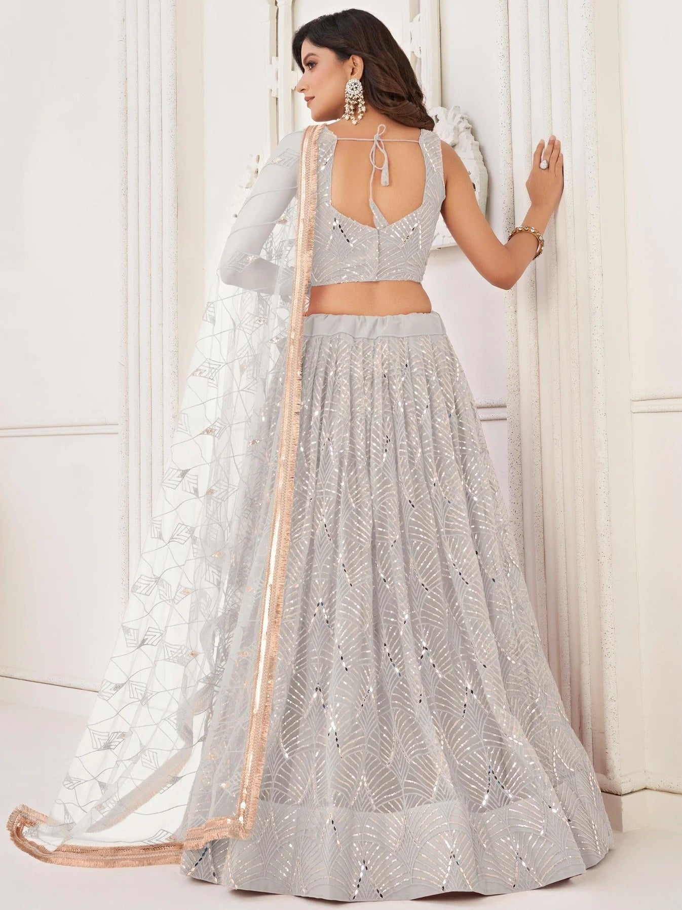 Stunning Off-White Sequins Net Wedding Wear Lehenga Choli With Dupatta